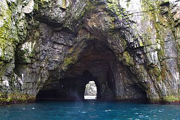 A sea arch through the Fuglefjellet cliffs (411m) on Bear Island   in the Svalbard Archipeligo form the highest seabird cliffs in the North Atlantic Ocean. 