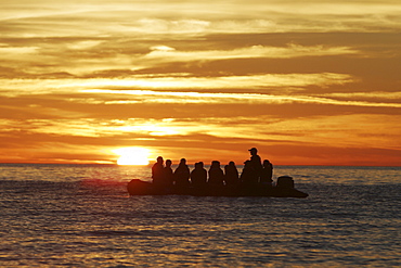 Sunrise on boaters in the Gulf of California (Sea of Cortez), Mexico.