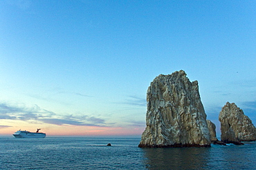 A view of Land's End (finisterra in Spanish), the famous granite arch formation just outside the harbor in Cabo San Lucas, Baja California Sur, Mexico.