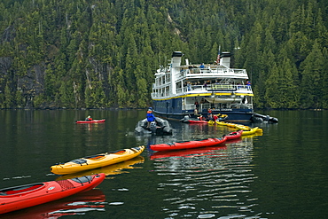 The Lindblad Expeditions ship National Geographic Sea Lion operating kayaks in Southeast Alaska, USA. Pacific Ocean.