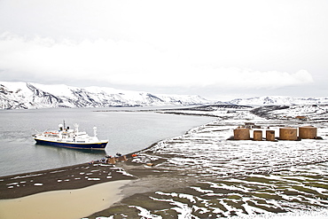 The Lindblad Expedition ship National Geographic Endeavour operating in Whalers Bay inside the caldera of Deception Island in the South Shetland Islands, Antarctica