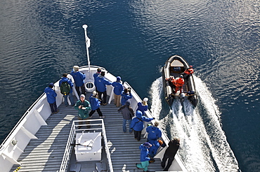 Natural history staff from the Lindblad Expedition ship National Geographic Endeavour in LeMaire Channel on the western side of the Antarctic Peninsula