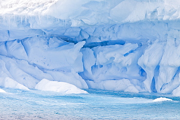 Iceberg detail in and around the Antarctic Peninsula during the summer months. More icebergs are being created as global warming is causing the breakup of major ice shelves and glaciers.