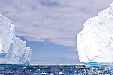 Iceberg detail in and around the Antarctic Peninsula during the summer months. More icebergs are being created as global warming is causing the breakup of major ice shelves and glaciers.