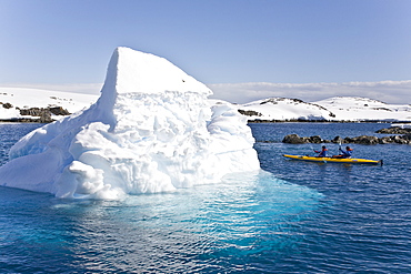 Guests from the Lindblad Expedition ship National Geographic Explorer kayaking in and around the Antarctic Peninsula in the summer months.