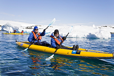 Guests from the Lindblad Expedition ship National Geographic Explorer kayaking in and around the Antarctic Peninsula in the summer months.