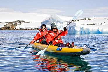 Guests from the Lindblad Expedition ship National Geographic Explorer kayaking in and around the Antarctic Peninsula in the summer months.