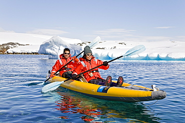 Guests from the Lindblad Expedition ship National Geographic Explorer kayaking in and around the Antarctic Peninsula in the summer months.