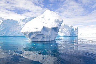 The Lindblad Expeditions ship National Geographic Explorer pushes through ice near Larrouy Island in Grandidier Channel