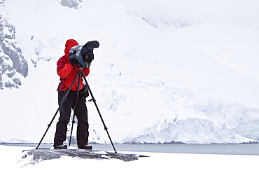 Natural history staff from the Lindblad Expedition ship National Geographic Explorer doing various things in and around the Antarctic Peninsula