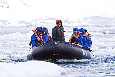 Natural history staff from the Lindblad Expedition ship National Geographic Explorer doing various things in and around the Antarctic Peninsula