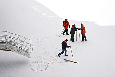 Natural history staff from the Lindblad Expedition ship National Geographic Explorer doing various things in and around the Antarctic Peninsula