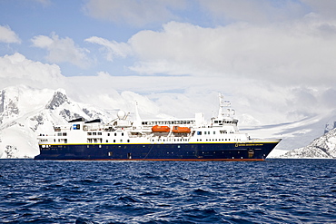 The Lindblad Expedition ship National Geographic Explorer operating in and around the Antarctic peninsula in Antarctica