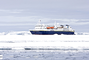 The Lindblad Expedition ship National Geographic Explorer operating in and around the Antarctic peninsula in Antarctica