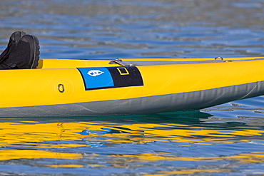 Guests from the Lindblad Expedition ship National Geographic Explorer kayaking near Monaco Glacier on Spitsbergen Island in the Svalbard Archipelago