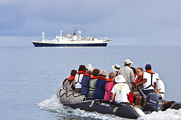 The Lindblad Expedition ship National Geographic Endeavour and its Zodiac fleet operating in the Galapagos Islands, Ecuador, Pacific Ocean.