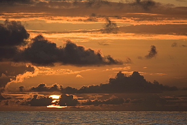 Sunrise or sunset at sea in the Atlantic Ocean from onboard the National Geographic Endeavour crossing the Atlantic Ocean from Lisbon, Portugal to Salvador, Brazil.