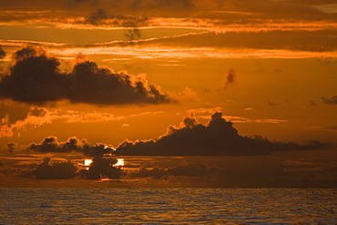 Sunrise or sunset at sea in the Atlantic Ocean from onboard the National Geographic Endeavour crossing the Atlantic Ocean from Lisbon, Portugal to Salvador, Brazil.