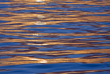 Sunrise or sunset at sea in the Atlantic Ocean from onboard the National Geographic Endeavour crossing the Atlantic Ocean from Lisbon, Portugal to Salvador, Brazil.