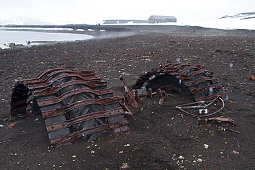 Tractor buried in ash at whalers bay inside of the caldera at Deception Island, South Shetland Islands, Antarctica, Southern Ocean