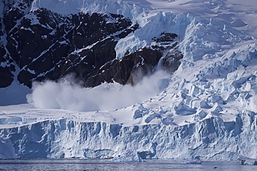 Small avalanche in Neko Harbour on the Antarctic Peninsula in Andvord Bay, Antarctica, Southern Ocean