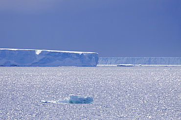 Huge tabular icebergs and smaller ice floes in the Weddell Sea, on the eastern side of the Antarctic Peninsula