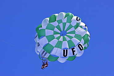 Commercial parasailing operations off the west side of the island of Maui, Hawaii, USA. MORE INFO Parasailing in Hawaii is limited seasonally to times of the year when humpback whales are not present.