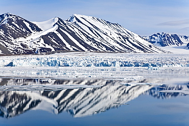 Approaching Monaco Glacier, in Liefdefjord near the northwest corner of Spitsbergen in the Svalbard Archipelago of Norway. 