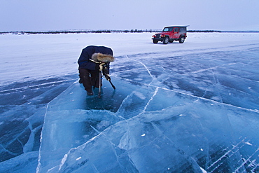 Canadian photographer Gilles Pucheu at work near his home in Yellowknife, Northwest Territories, Canada. MORE INFO Model release number GP032810.