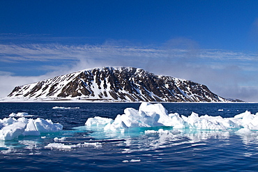 A view of ice-covered Phippsoya, the largest of the Sjuoyane Islands in the Svalbard Archipelago, Norway