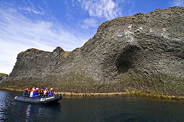 Zodiac cruising among columnar basalt in Hvalvï¿½Ã¯ï¿½Â¿ï¿½Â½ï¿½Ã‚ï¿½Â¡k Bay on the northern coast of Iceland