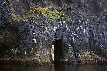 Zodiac cruising among columnar basalt in Hvalvï¿½Ã¯ï¿½Â¿ï¿½Â½ï¿½Ã‚ï¿½Â¡k Bay on the northern coast of Iceland