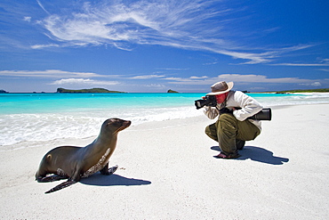 Staff (shown here is National Geographic photographer Joel Sartore) from the Lindblad Expedition ship National Geographic Endeavour in the Galapagos Islands, Ecuador