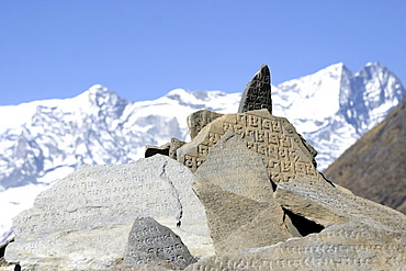 Everest Trail Scenic. Mountains, Prayer Flags, Stone prayer carvings.