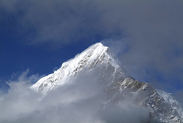 Tibetan  Mountain and Clouds.  Himalayas, Tibet.