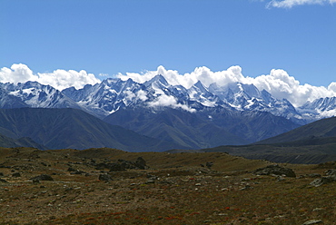 Tibetan  Mountain and Clouds.  Himalayas, Tibet.