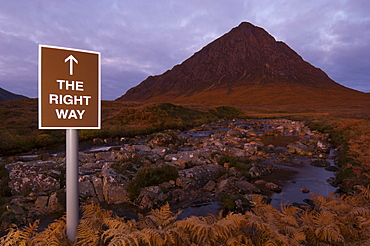 Spoof tourist sign  in front of  Buachaille Etive Mor, Scotland