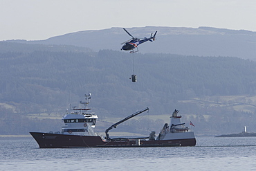 Supplying salmon farm. Hebrides, UK.