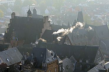 Rooftops of medieval buildings in Marburg, including Town Hall and Old University on a cold, misty autumn morning, Marburg, Hesse, Germany, Europe