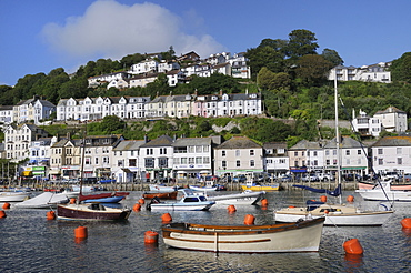 Sailing yachts and fishing boats moored in Looe harbour, Cornwall, England, United Kingdom, Europe