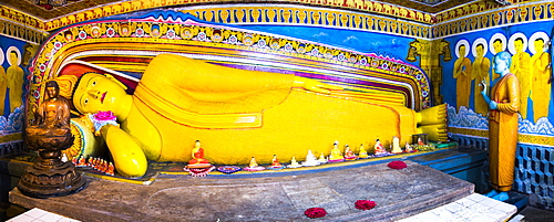 Golden reclining Buddha at Temple of the Tooth (Temple of the Sacred Tooth Relic) in Kandy, Sri Lanka, Asia 