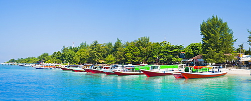 Gili Trawangan harbour, traditional boats on the crystal clear ocean at Gili Trawangan, Gili Islands, Indonesia, Southeast Asia, Asia