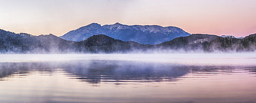 Misty sunrise at Nahuel Huapi Lake (Lago Nahuel Huapi), Villa la Angostura, Neuquen, Patagonia, Argentina, South America