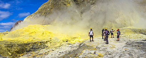 Tourists exploring White Island Volcano, an active volcano in the Bay of Plenty, North Island, New Zealand, Pacific