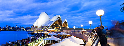 Sydney Opera House, UNESCO World Heritage Site, and people at the Opera Bar at night, Sydney, New South Wales, Australia, Pacific