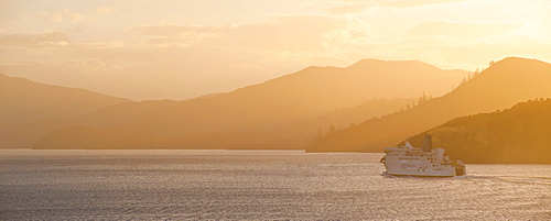 Queen Charlotte Sound at sunset, the Interislander ferry between Picton, South Island and Wellington, North Island, New Zealand, Pacific 