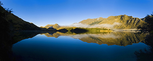 Misty reflections at dawn, Lake Moke, Queenstown, Otago, South Island, New Zealand, Pacific 