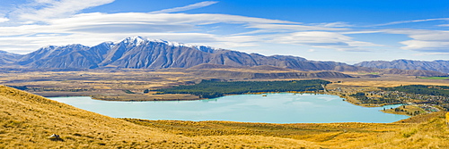 Lake Tekapo and snow capped mountains, Southern Lakes, Canterbury Region, South Island New Zealand, Pacific 