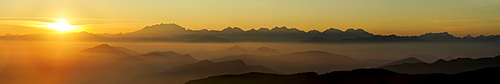 Sunset above Monte Rosa and Valais Alps, Ticino Alps in foreground, Monte Bisbino, Lake Como, Lombardy, Italy