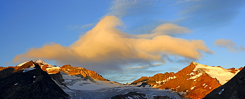 panorama in Oetztal range, clouds above Wildspitze, Mittelbergjoch and Hinterer Brunnenkogel, hut Braunschweiger Huette, Oetztal range, Tyrol, Austria